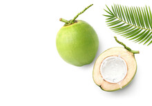Flat Lay Of Coconut Juice Splash In Half Fruit Isolated On White Background.