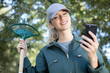 © auremar - happy female gardener doing a selfie