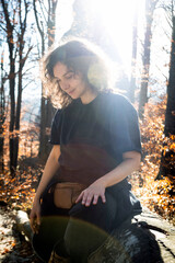 Wall Mural - tourist girl in the autumn forest