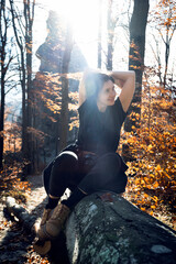 Wall Mural - tourist girl in the autumn forest