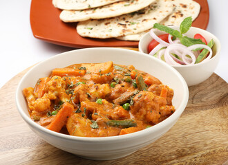 Indian food Mix vegetable curry with Tandoori roti or nan, Indian flat bread