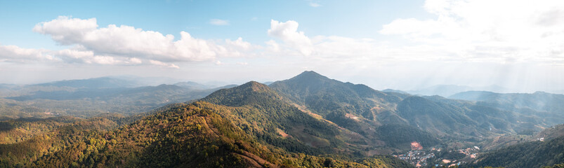 Canvas Print - high angle view of forest and mountains in summer