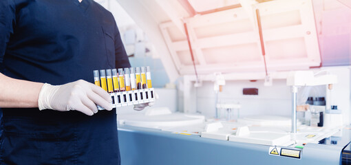 Wall Mural - banner medical blood tests on automatic modern equipment