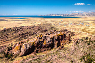 Sticker - Reddish rock formations in Aramu Muru near Puno in Peru