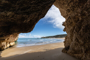 Wall Mural - Mannacora or Manaccora a beautiful beach seen through a cave on Apulian coast. Peschici, Puglia (Apulia), Italy, Europe