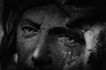 Fototapete - Dramatic image of look of Jesus Christ in a crown of thorns. Fragment of an ancient statue.