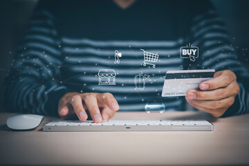 Poster - Man holding credit card and using smartphone at home office, businessman shopping online, e-commerce, internet banking, spending money, shopping online, e-commerce, internet banking, spending money.