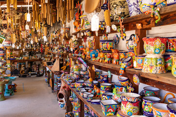 Wall Mural - Variety of Colorfull Mexican Traditional Souvenirs at Market in Mexico.