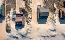 Aerial View Top Down Of Homes On The Beach In Nags Head