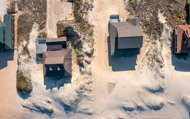 Wall Mural - Aerial view top down of homes on the beach in Nags Head