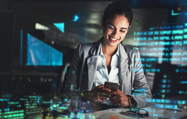 Poster - Networking through the night. Shot of a young businesswoman working late at night in a modern office superimposed over a cityscape.