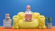 Happy young woman sitting on yellow sofa. Excited studying learning and researching information from computer.