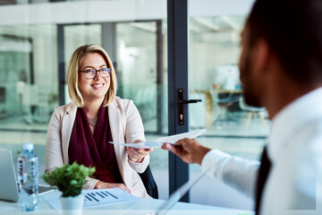 Poster - Here are the documents you requested. Cropped shot of businesspeople in the workplace.