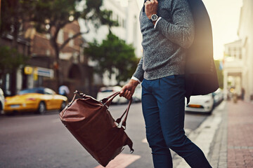 Poster - Hes fashionably on his way. Cropped shot of a fashionable young man out in the city.