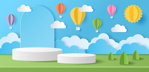 Canvas Print - Paper cut of Summer season on green nature landscape, hot air balloons, sun and clouds on blue sky background with white color cylinder podium for your products display presentation