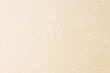 © ronnarid - White beige paper background texture light rough textured spotted blank copy space background in beige yellow; brown