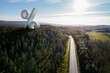 © Johnér - Large percent symbol in green landscape
