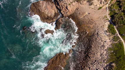 Ariel View of the rocks and ocean from the Top 