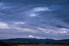 Beautiful Scene Of Mount McLoughlin Old Volcano In Oregon With Large Purple Cloudy Sky In USA