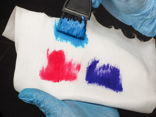 dye sample on a white background. a palette of many bright colors. modern trendy hairstyle in salon. hair dye kit.