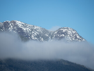 Sticker - Mountain peeking out of the clouds 