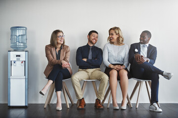 Poster - Who will be the top choice. Studio shot of businesspeople waiting in line against a white background.