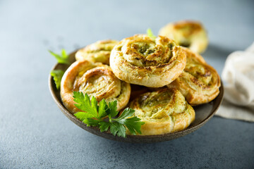 Wall Mural - Homemade puff pastry swirls with pesto sauce