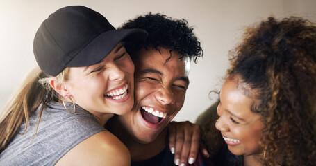 Poster - We are so happy we have each other. Cropped shot of a young diverse group of dancers holding each other and laughing against a walled background outside.