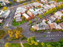 Aerial View Of A Busy Road Intersection And Roundabout In An Inner City Suburb