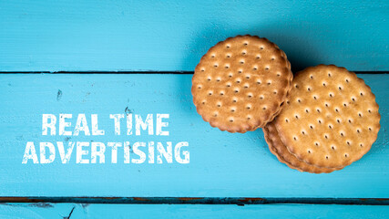 Wall Mural - Real Time Advertising. Stack of cookies on a blue wooden background