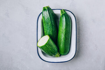 Wall Mural - Zucchini. Fresh raw organic zucchini ready for cooking, top view