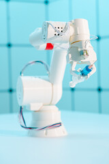 Canvas Print - Robot hand with a medical syringe. Future medicine concept using robots and artificial intelligence