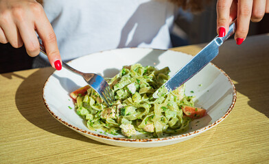 Sticker - woman eating italian pasta in cafe