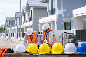 Poster - Engineers group consult construction on site building working at construction site,Construction residential new house in progress at building site.