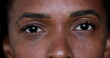 © Marco - Black African woman opening eyes close-up face and eyes