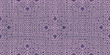 Seamless vintage violet intricate retro art deco batik pattern on weathered boho textured fabric, a trendy contemporary ethnic tribal textile for interior decor and fashion.