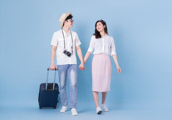 Full length image of young Asian couple travel, summer vacation