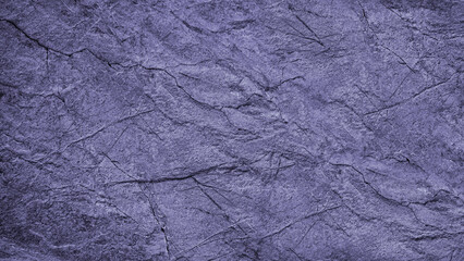 Wall Mural - Dirty purple grunge background. Toned rough cracked rock surface texture. Close-up. Blue stone background with space for design.