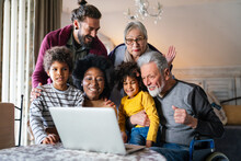 Extended Multiethnic Family Together At Home During Video Call. People Happiness Technology Concept