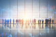 © Who is Danny - Backlit crowd of businessmen working together in bright office interior with sunlight and glowing business chart hologram. Teamwork, finance, forex and corporate workplace concept. Double exposure.