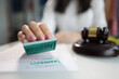 © H_Ko - Judge puts approved seal on document in court closeup