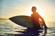 © Lyndon S/peopleimages.com - You keep calm, Ill go Surf. Shot of a young boy out surfing.
