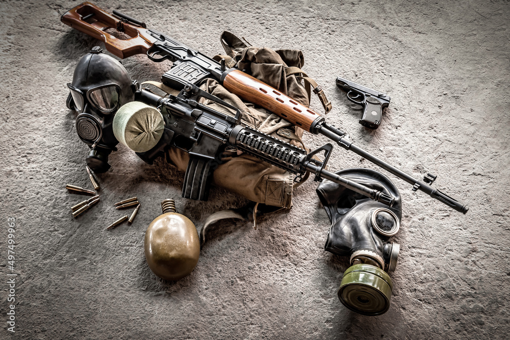 automatic carabine, sniper rifle, backpack and gas mask Stock Photo ...