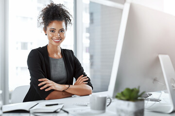 Aufkleber - Confident about the state of business. Portrait of a young businesswoman working at her desk in a modern office.