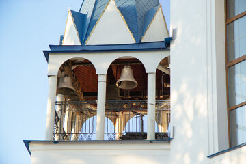 Wall Mural - a small belltower with bells on the tower of the temple