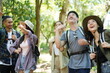 © phonix_a - Asian friends group enjoy hiking on vacation.