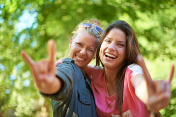 Sticker - Having fun with my best friend. Two young female friends having fun at an outdoor event.