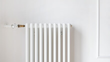Radiator Of The Central Heating System Installing On Wall
