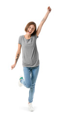 Wall Mural - Happy young woman in stylish t-shirt on white background