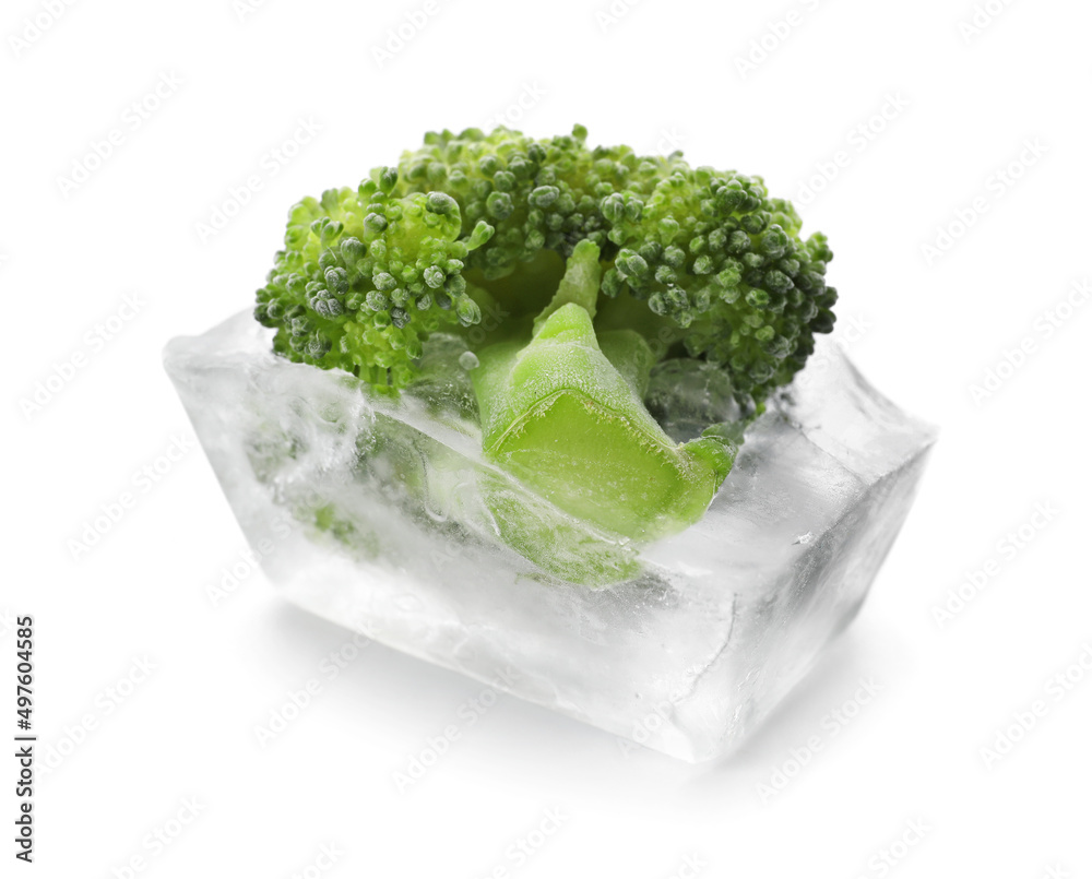 Fresh broccoli frozen in ice on white background